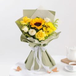 Alternative view of Pineapple Cake & Radiant Yellow Sunflower Bouquet