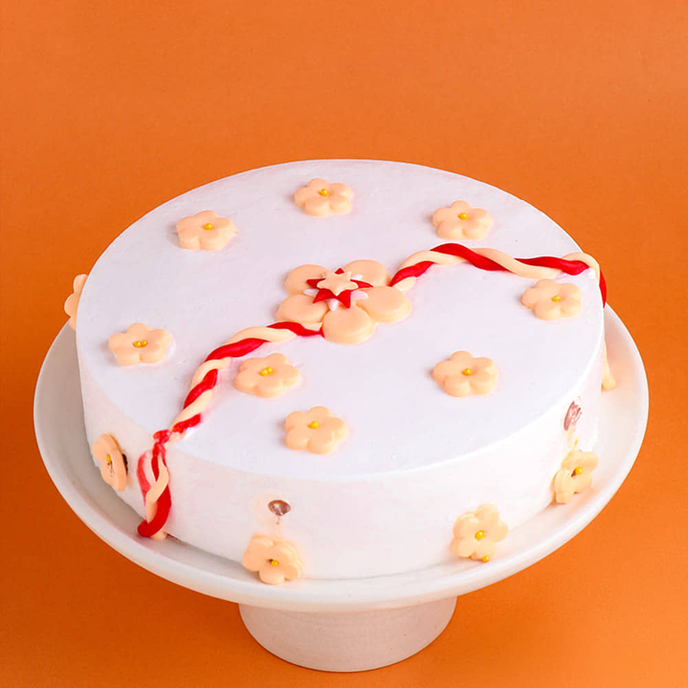 Pineapple Cake with Rakhi Combo