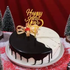 This New Year Theme Chocovanilla Cake